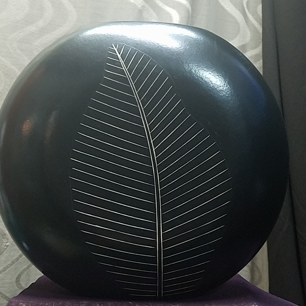 Wood carved vase
